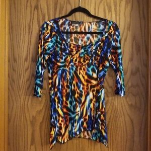 Bright colored slinky material shirt size M